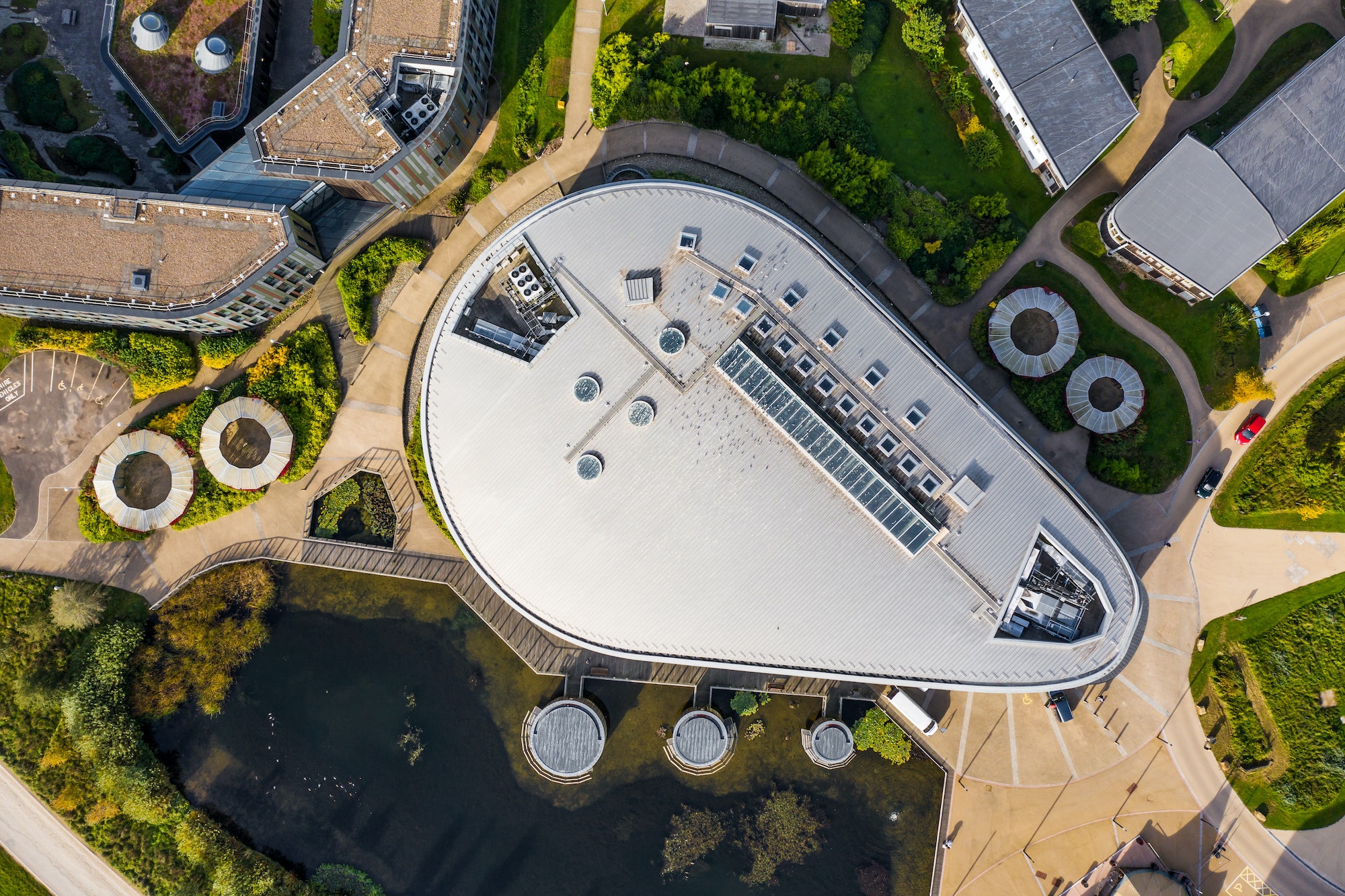 Aerial view of a futuristic building designed by an architect